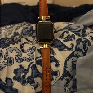 Apple Smartwatch with Gold Case and Tan Leather Strap